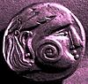 Click image for larger version. 

Name:	Novo Obverse of a Celtic Scordisci silver tetradrachm from the Banat region of Serbia. Spiral an.jpg 
Views:	2 
Size:	59.4 KB 
ID:	361153